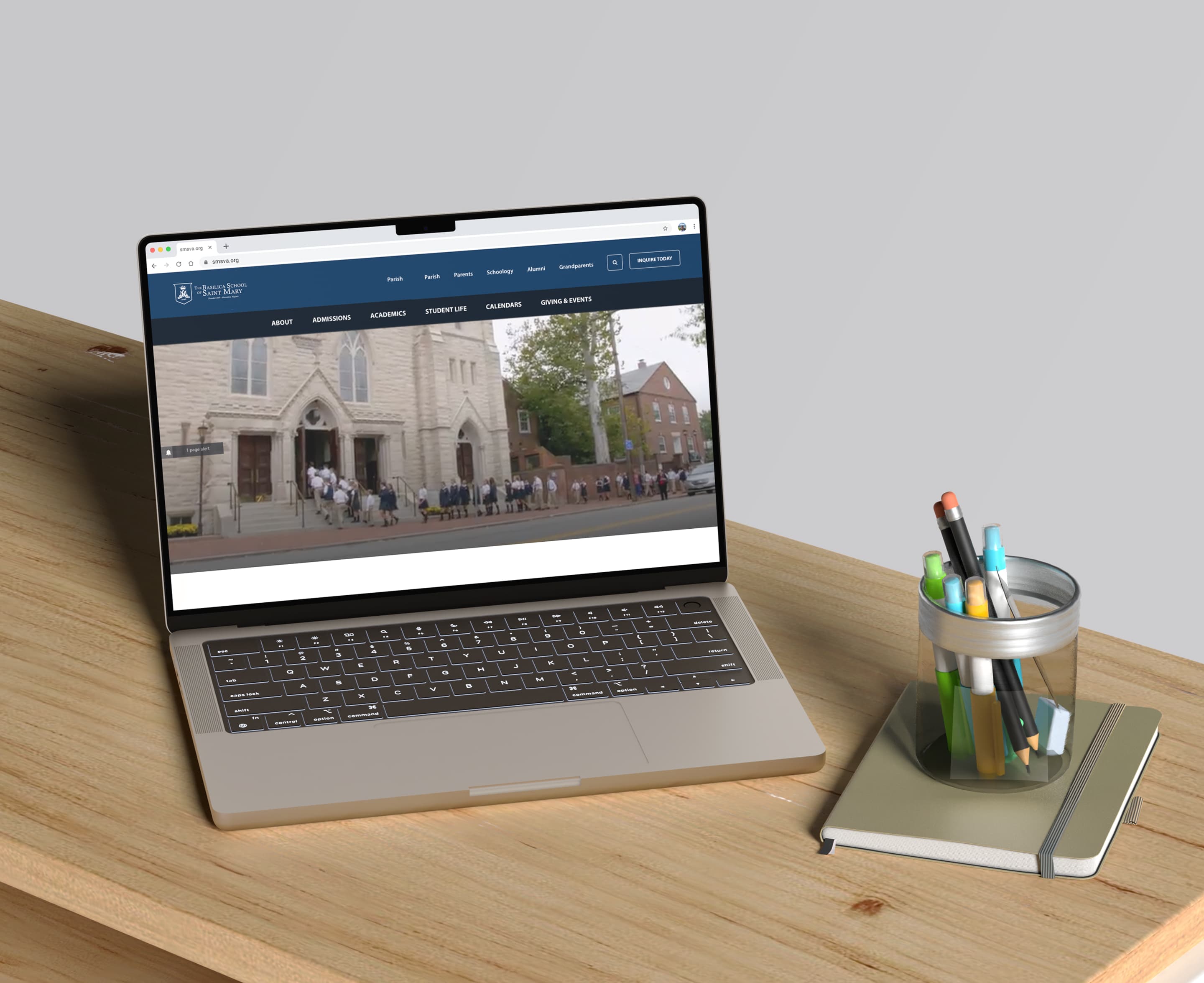Basilica School website shown on a laptop