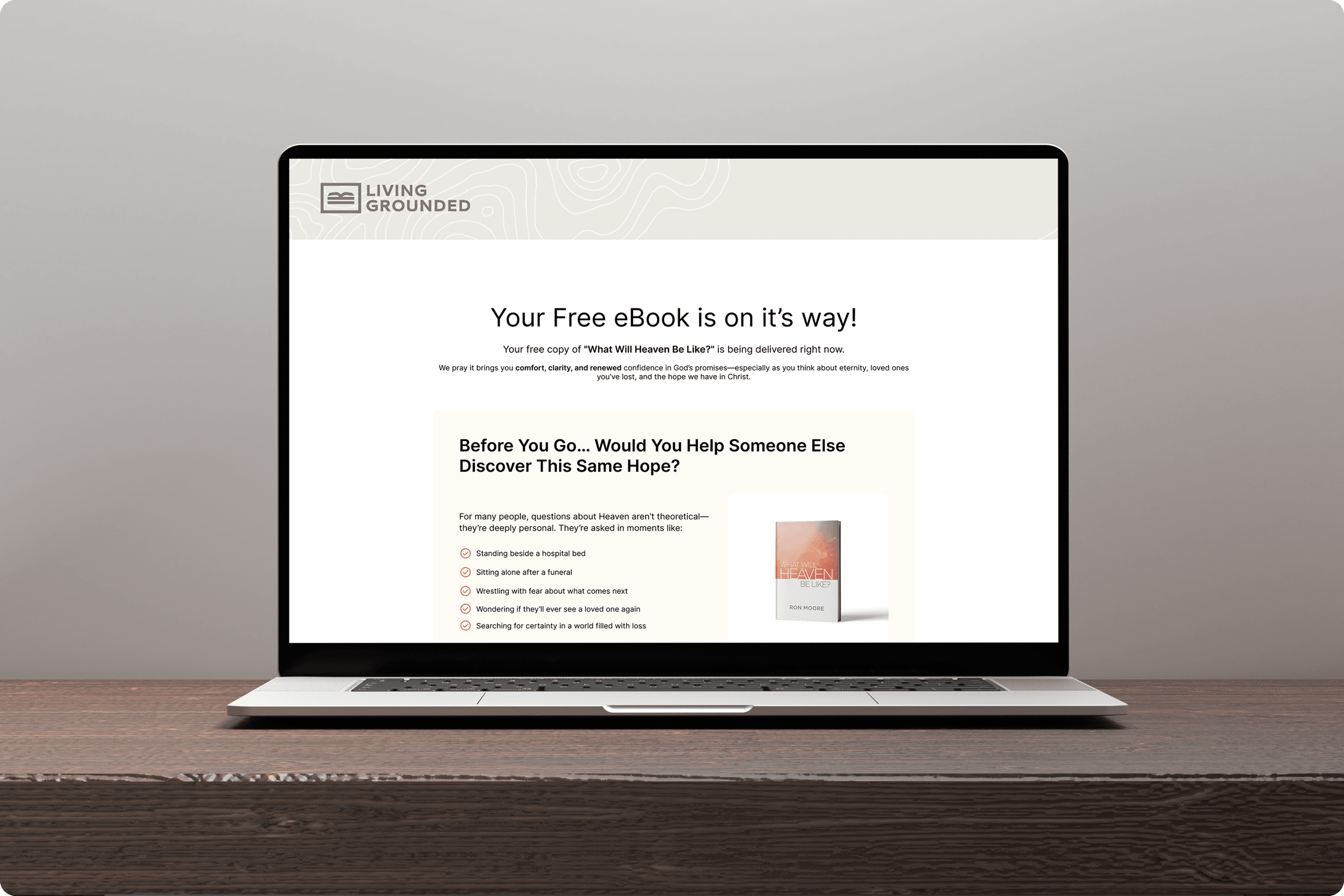 Living Grounded website shown on a laptop mockup